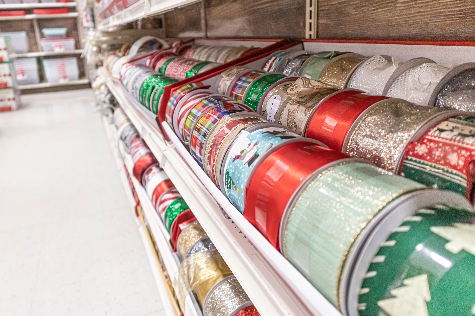 Christmas ribbons on display for sale in retail store